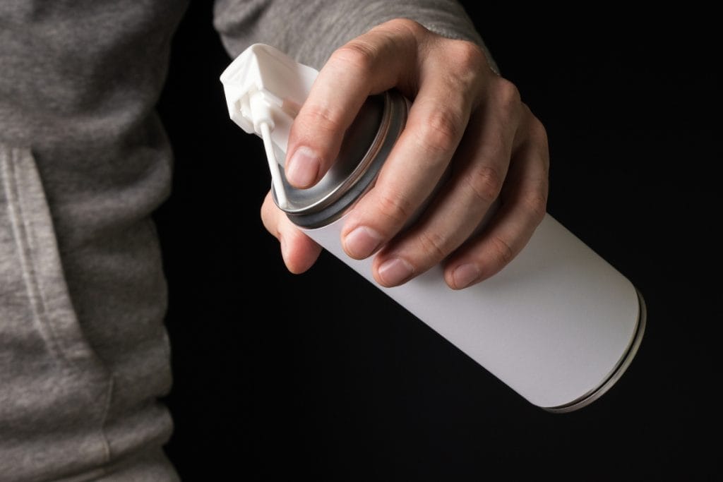 compressed air to clean smoke alarm