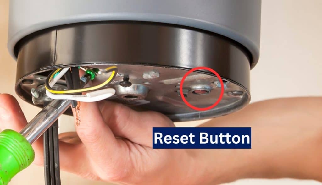 reset garbage disposer