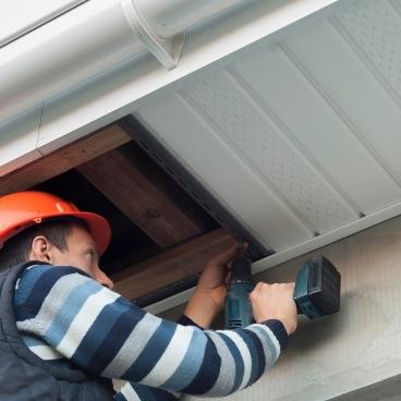 how to vent bathroom fan through soffit