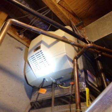how does a whole house humidifier work